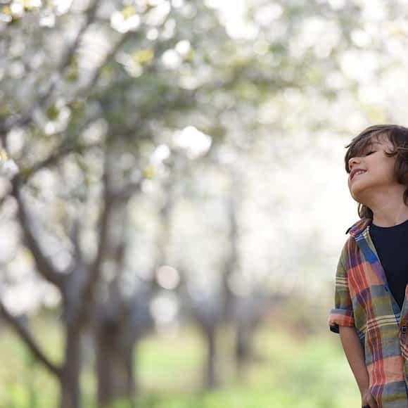 boy looking up posing for photo shoot 1416741