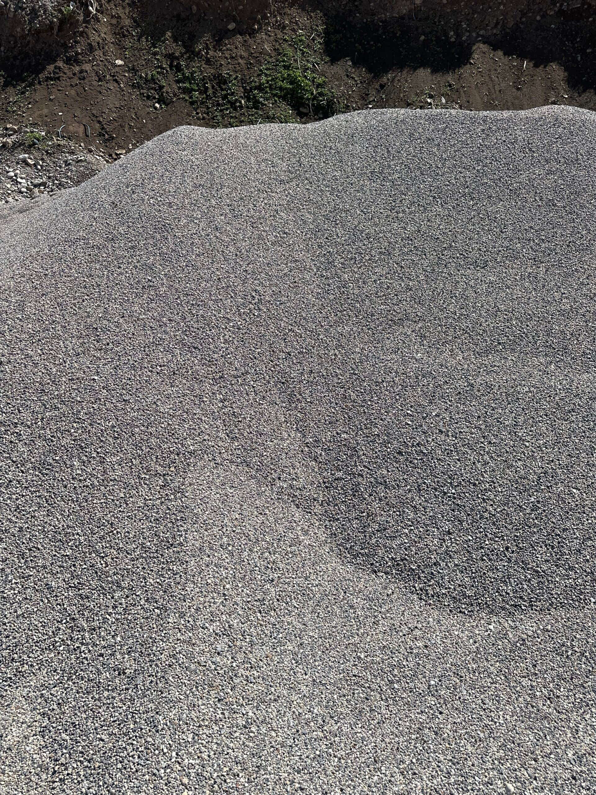 Darby Pit, Gravel & Trucking - We specialize in providing top-quality materials such as dirt, sand, gravel, crushed stone, and the essential services of trucking for excavation, landscaping, home building projects, road construction, pathways, driveways, and foundations. A substantial pile of Pea Gravel is available on-site amidst the backdrop of natural greenery—ideal for any landscaping endeavor.