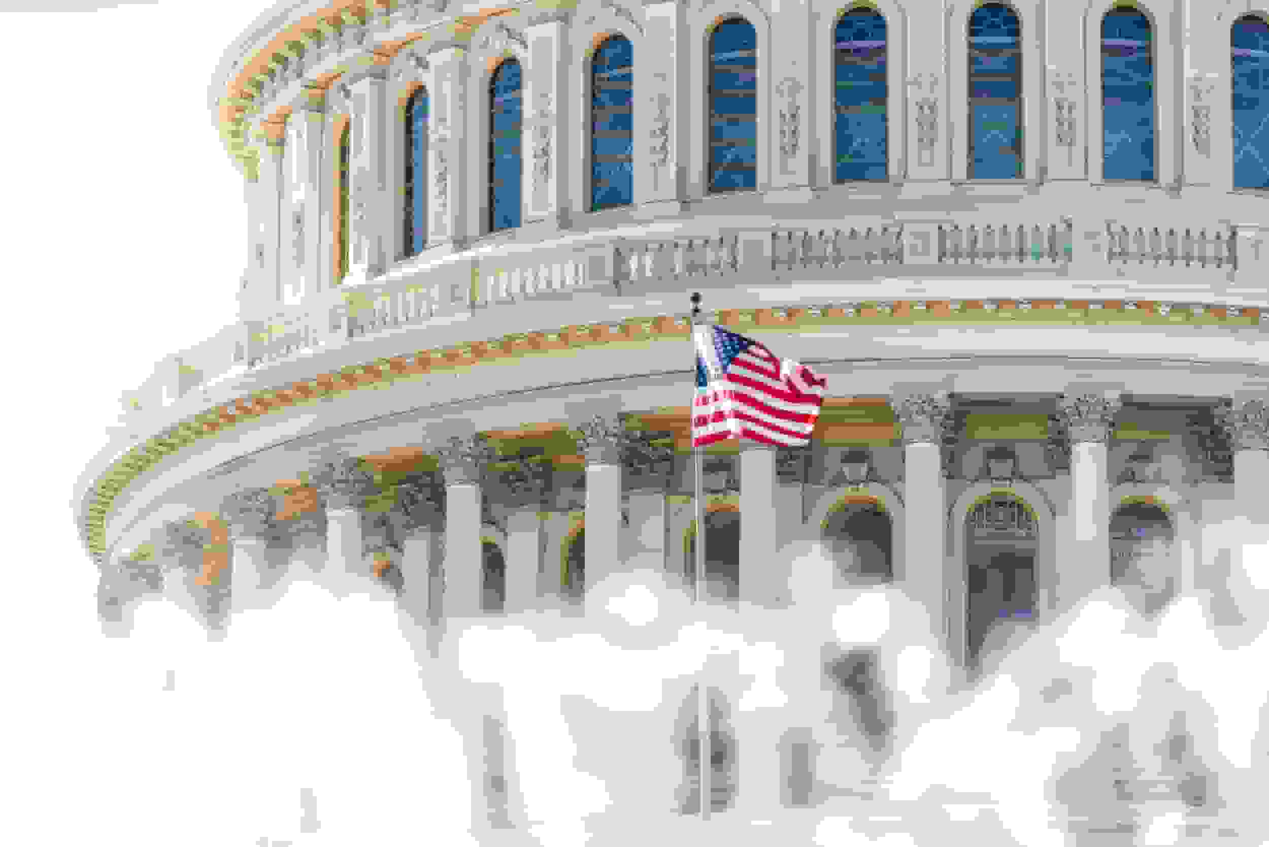 Us congress dome closeup with background of water fountain splashing, american flag waving in washington dc, usa closeup on capital capitol hill, columns, pillars, nobody