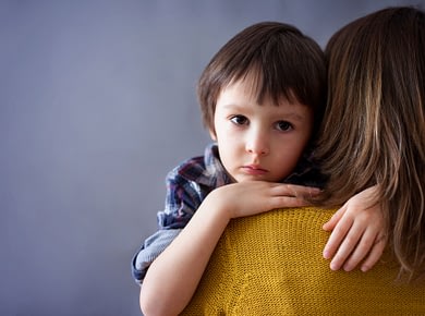 Sad Little Child, Boy, Hugging His Mother At Home